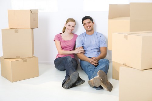 Residents placing large furniture items for collection in Basildon.